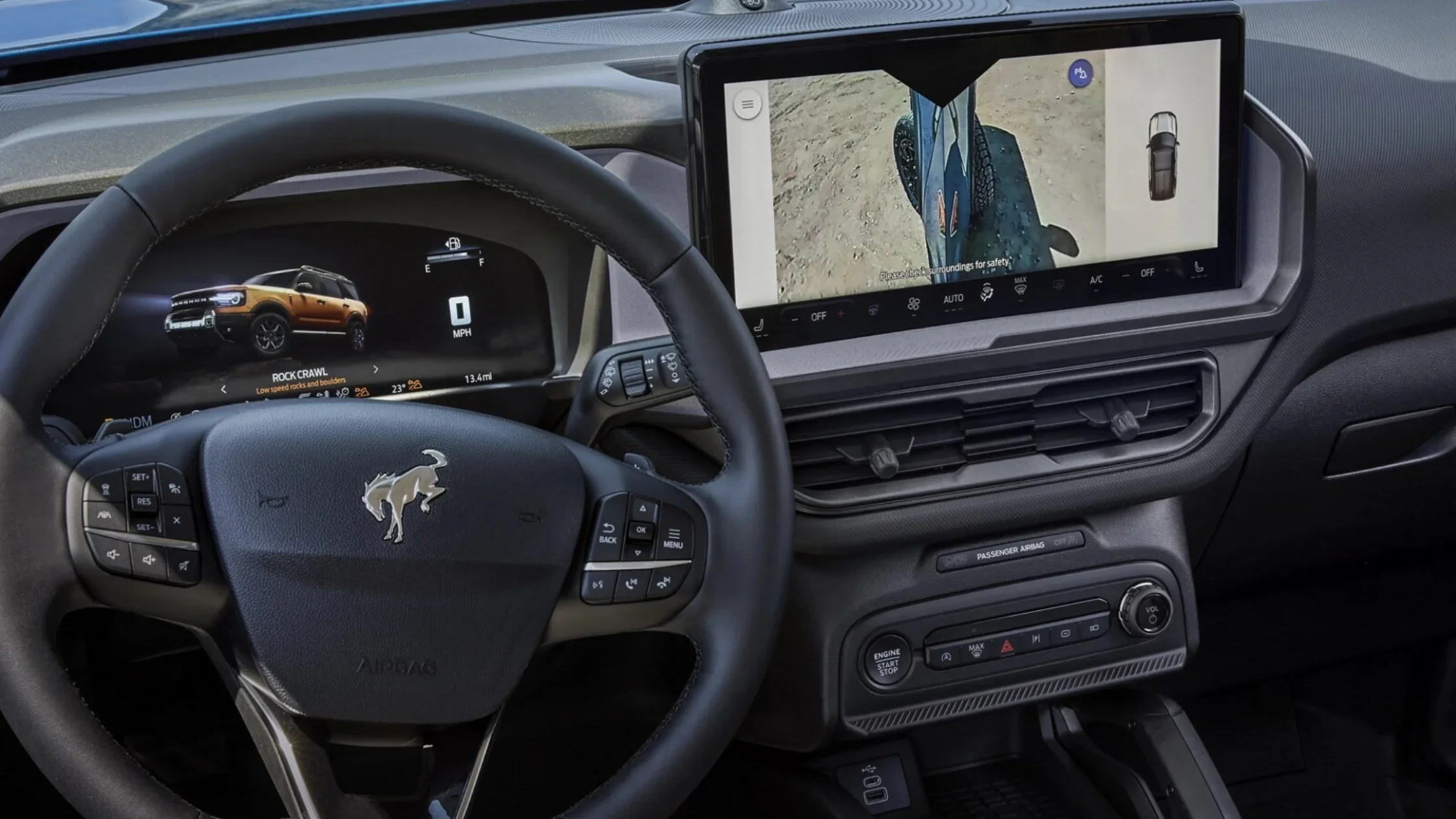 2025 Bronco Sport® steering wheel and digital cluster with touchscreen off-road display.