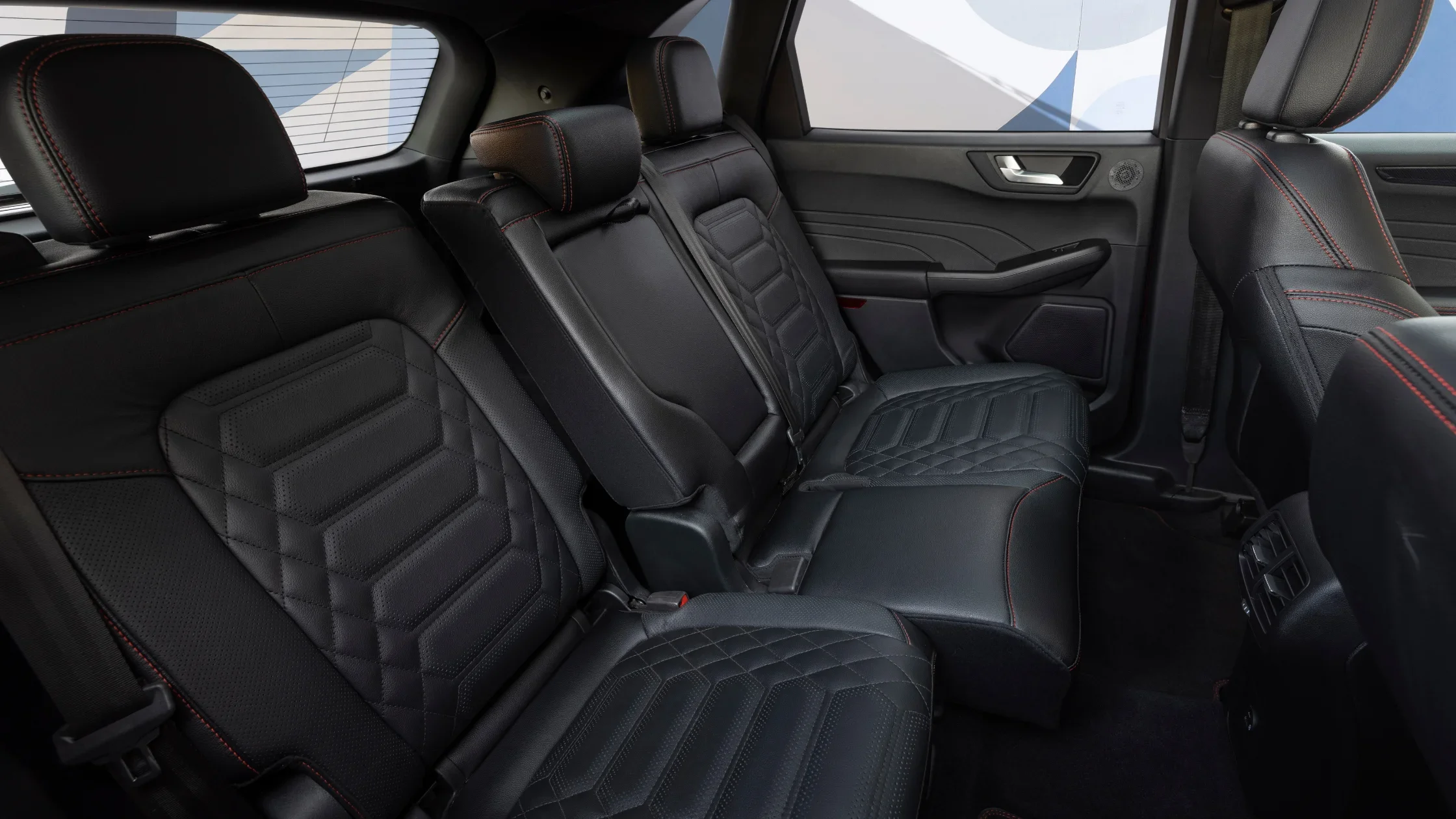 2025 Ford Escape® ST-Line Hybrid rear seats with black quilted leather upholstery and red contrast stitching