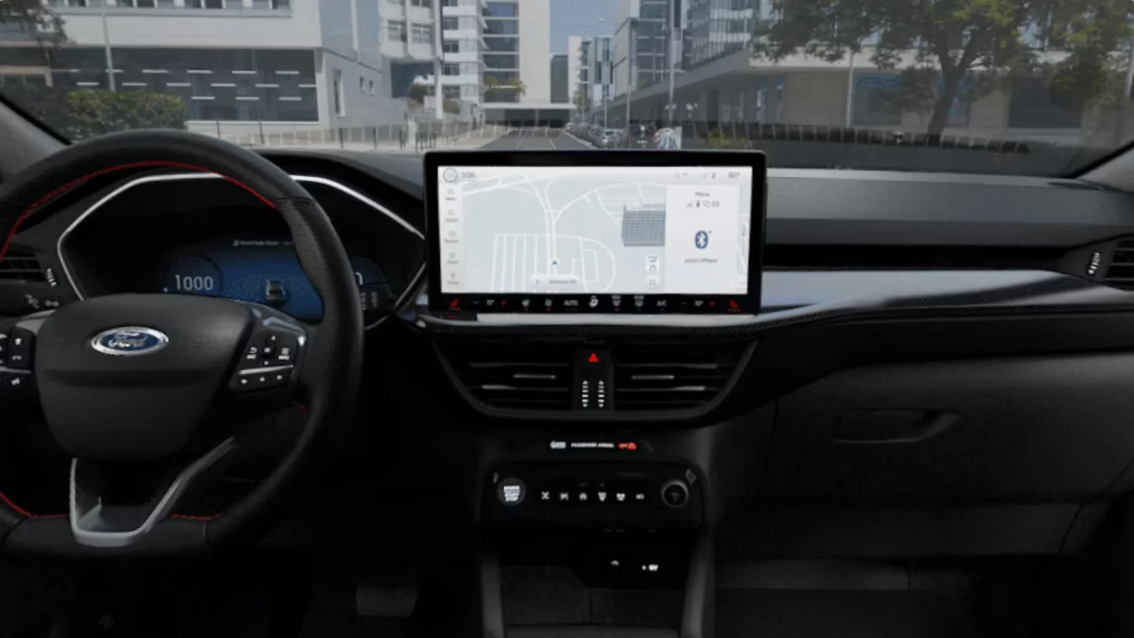 2025 Ford Escape® ST-Line Hybrid dashboard with touchscreen display and red-stitched steering wheel.