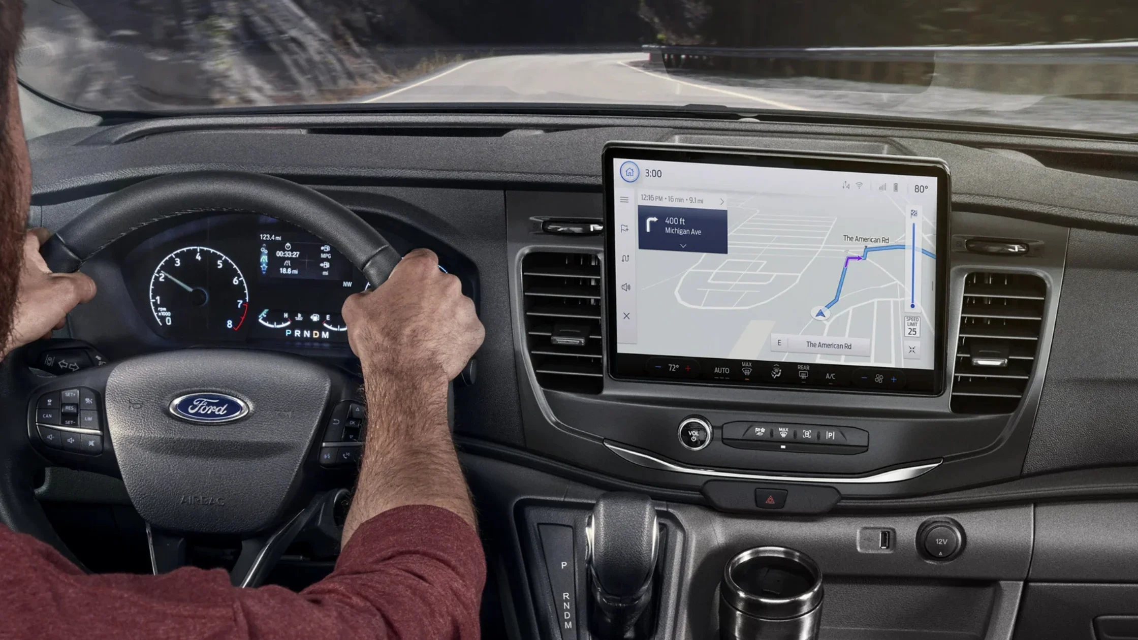 Driver's view of 2025 Ford Transit interior showcasing digital gauge cluster and navigation screen