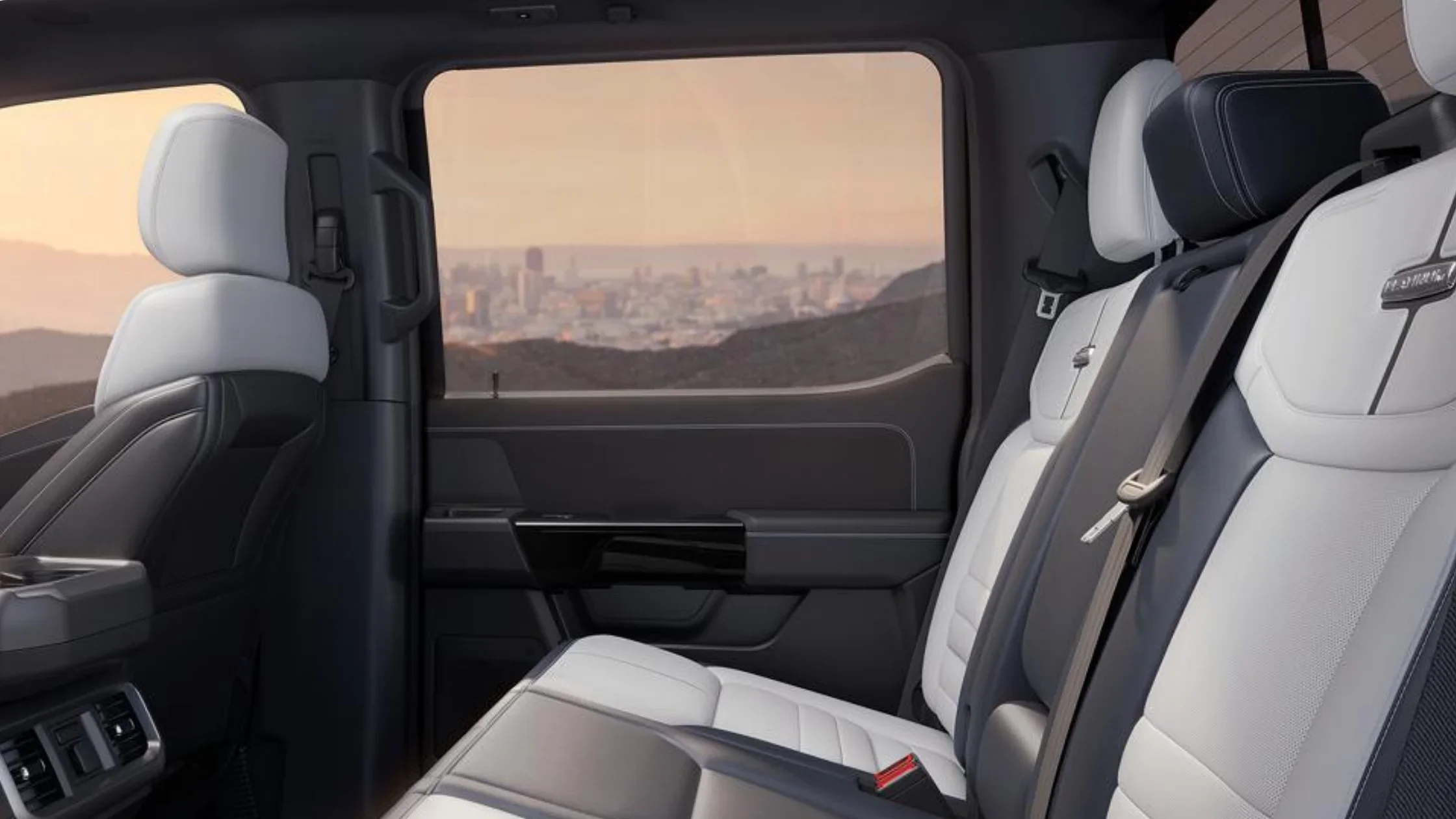 2024 Ford F-150® Lightning rear seats in two-tone leather upholstery with premium stitching and spacious layout
