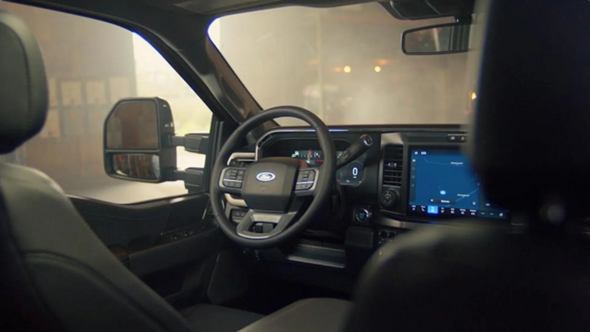 Interior shot of the 2025 Ford Super Duty® F-250® dashboard featuring the steering wheel, digital display and SYNC® touchscreen.